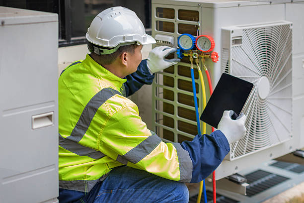 Professional Hvac technician working in Oakland Gardens, NY